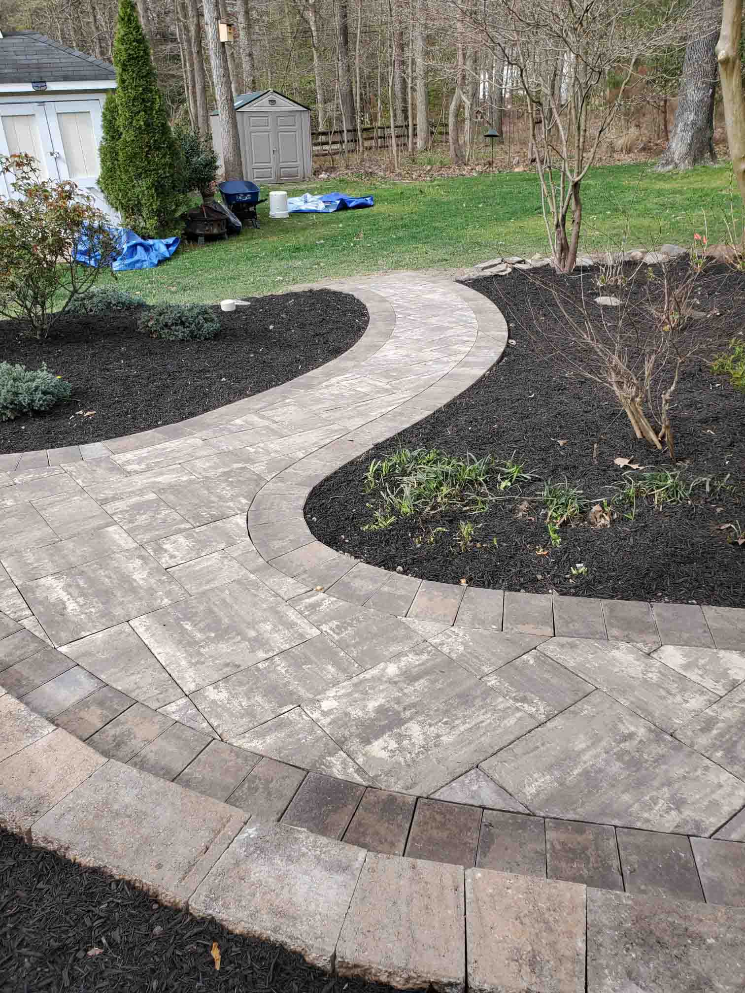 Eye Catching Walkway Pavers Project in Backyard